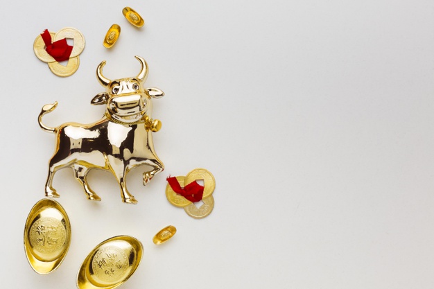 traditional-new-year-chinese-ox-golden-objects_23-2148754776